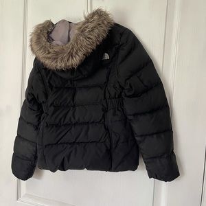 Black. Good condition small nic on arm